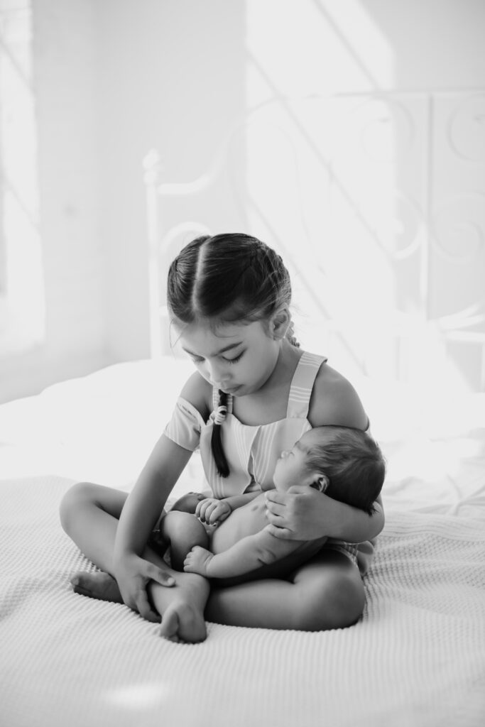 sister and baby newborn session